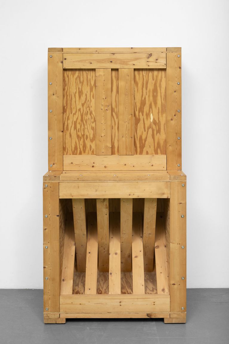 RA-19 (1995), a sturdy-looking box that appears to conceal a package object waiting to be installed, its outline suggesting one of Artschwager's piano sculptures, is empty
