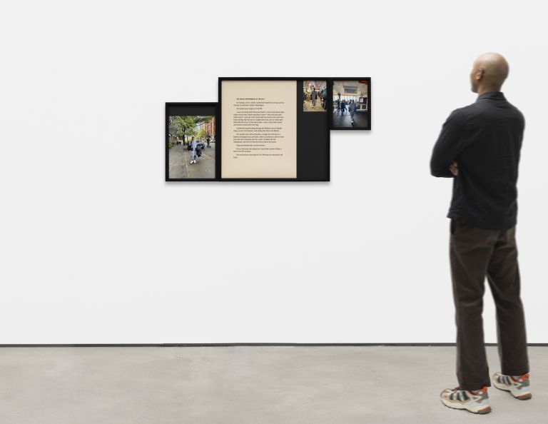 Framed artwork displaying text and photographs documenting street performance, including urban sidewalk and indoor institutional spaces.