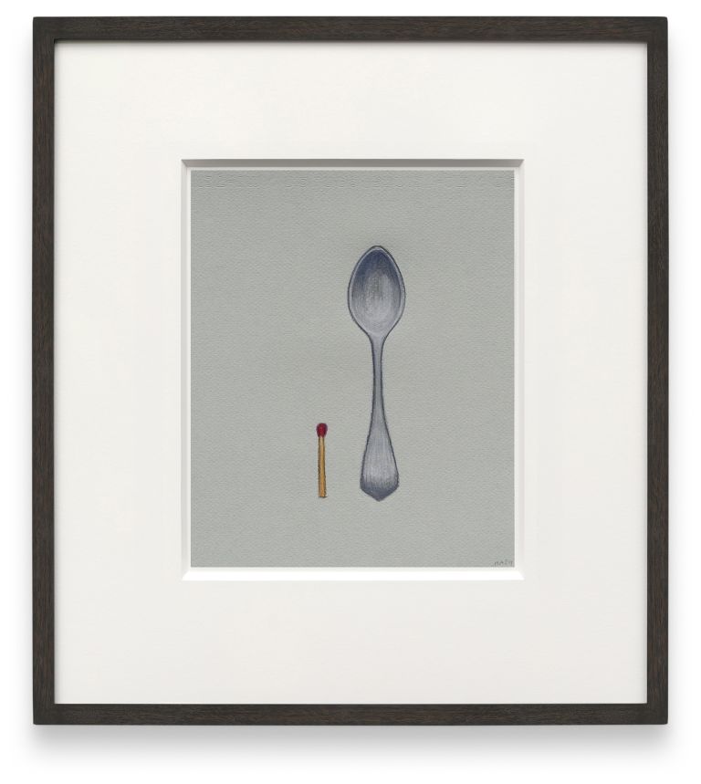 Framed artwork showing a large silver spoon and small match against a gray background in minimal composition.