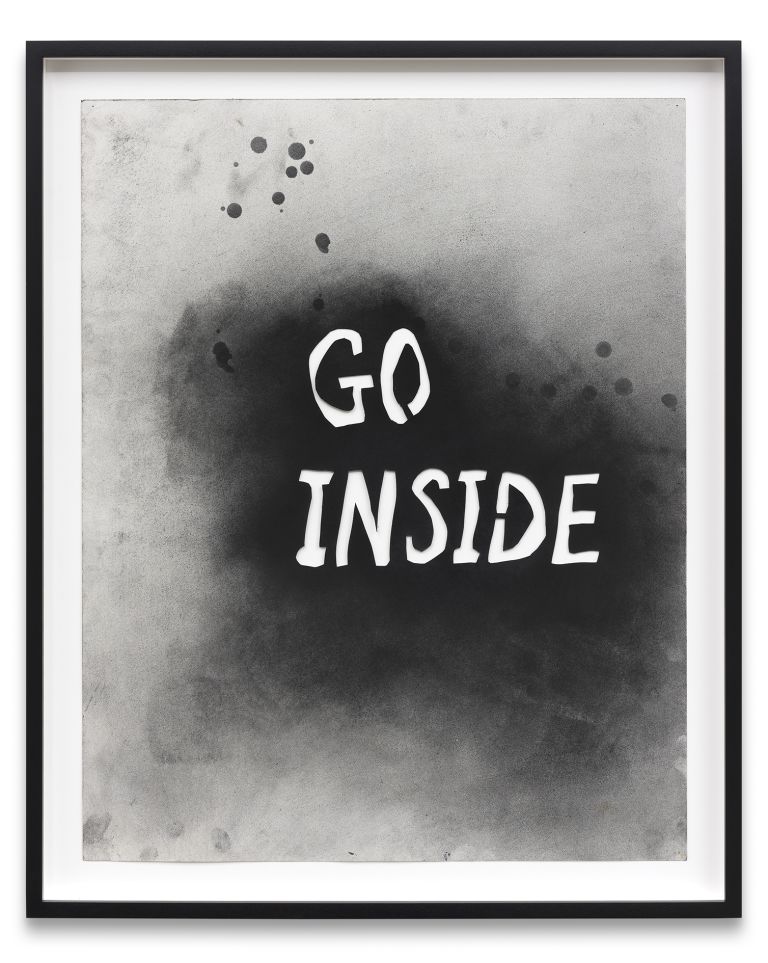 Black and white watercolor artwork with text "GO INSIDE" in white letters against a dark, smoky background, displayed in a black frame.