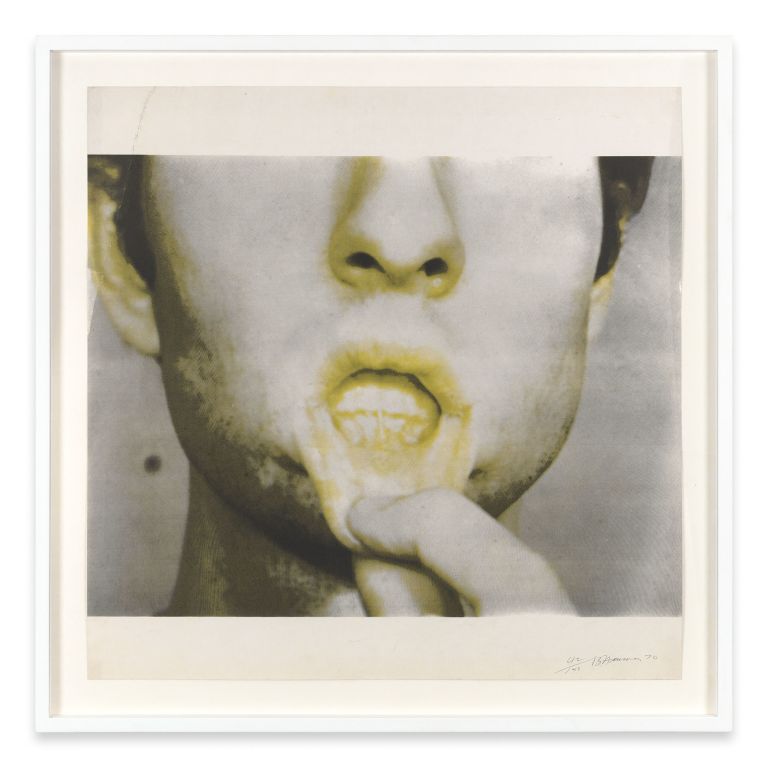 Five framed photographs arranged in a cross pattern showing close-up images of hands covering facial features, tinted yellow-green