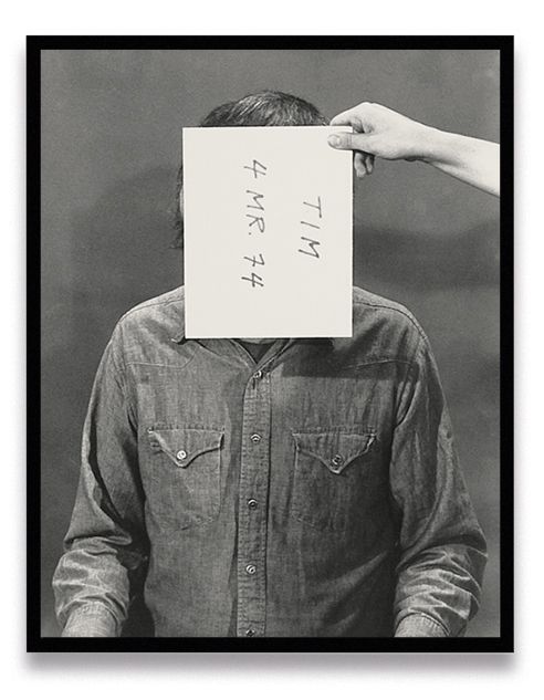 Six sequential black-and-white portraits of person in denim shirt with paper covering face displaying handwritten text