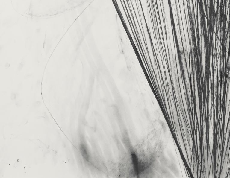 Framed abstract drawing showing heart-shaped black graphite burst with flowing radiating lines