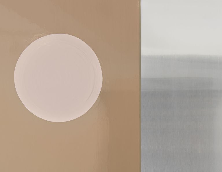 Four-panel artwork: terracotta and purple flanking a reflective silver center, two pale pink circles above a white line.