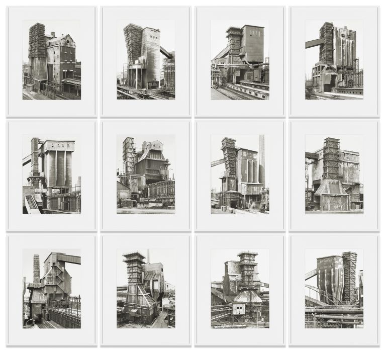 Grid of 12 black and white photographs showing industrial processing towers and blast furnace structures