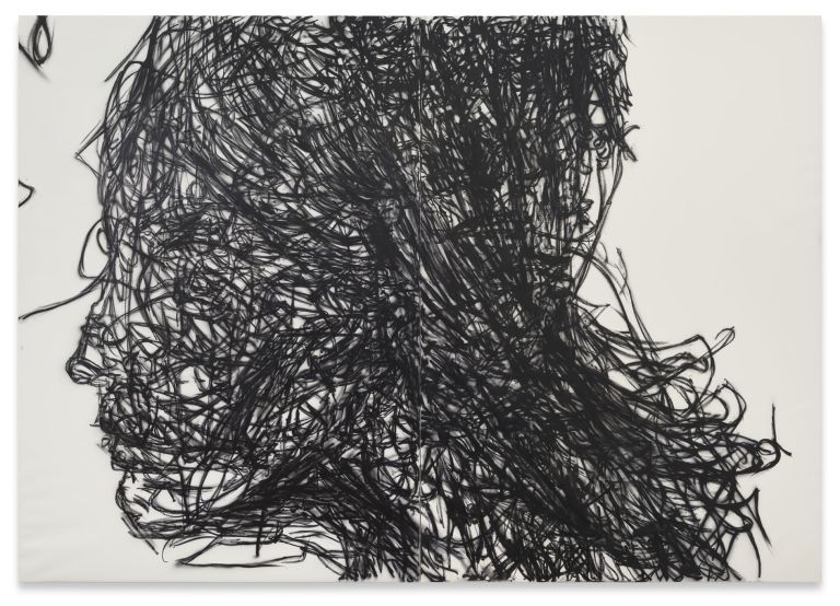 Large diptych canvas: a monumental head emerges from thousands of dense black scribbled lines layered over a white ground.