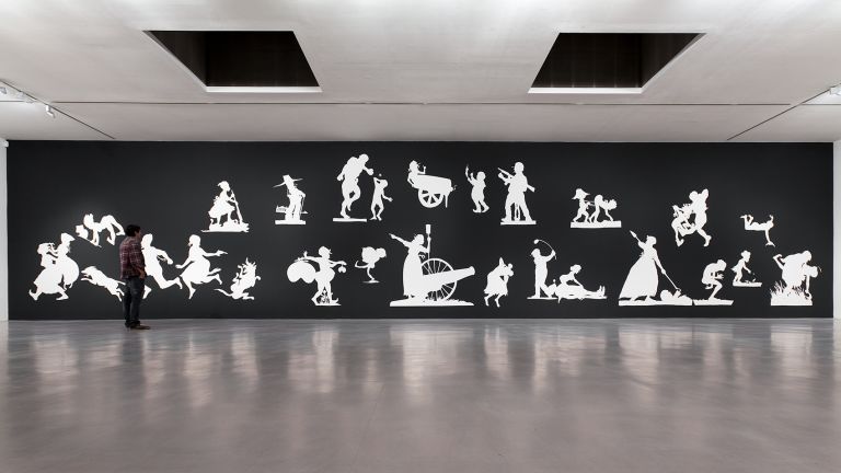 Kara Walker
We at the Camden Arts Centre are Exceedingly Proud to present an Exhibition of Capable Artworks by the Notable Hand of the Celebrated American, Kara Elizabeth Walker, Negress, installation view, Camden Arts Centre, London, 2013&ndash;14
Photo: Angus Mill Photography