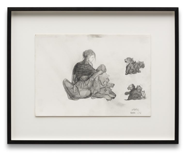Three framed drawings arranged on white wall showing figural sketches and studies in graphite or charcoal.