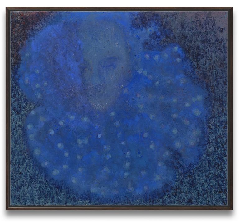 Blue painting with ethereal, cloudy forms and subtle face-like impressions emerging from deep blue and darker tones, displayed in brown frame.