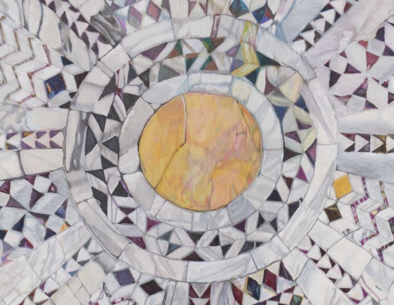 Circular mosaic with radiating segments displaying different geometric patterns, centered around yellow focal point in wooden frame