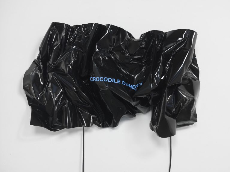 Gretchen Bender
Top Ten Grossing Films of 1988: Crocodile Dundee II, 1989
Heat-set vinyl, paint, neon
50.8 × 83.8 × 22.9 cm | 20 × 33 × 9 inches
Edition of 1 + 1 AP