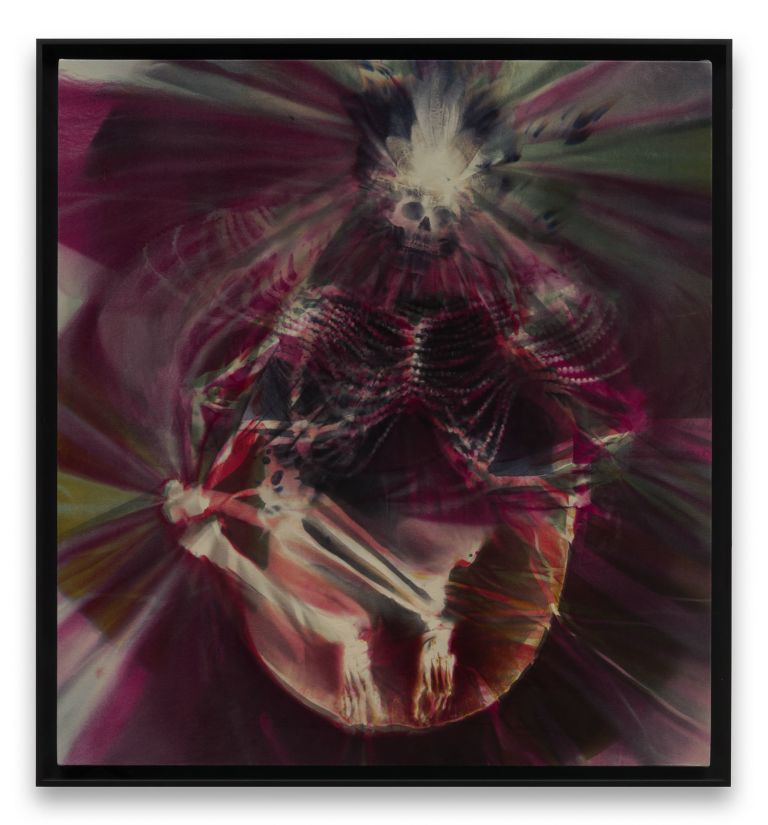 Abstract digital artwork featuring a distorted human skeleton figure surrounded by radiating magenta, red, and green light patterns.