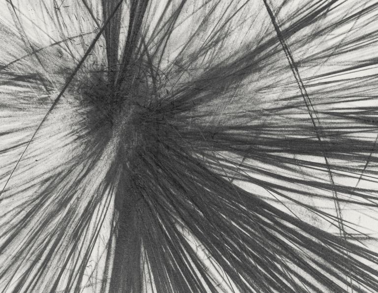 Framed abstract drawing with dense black graphite lines exploding outward in all directions on white