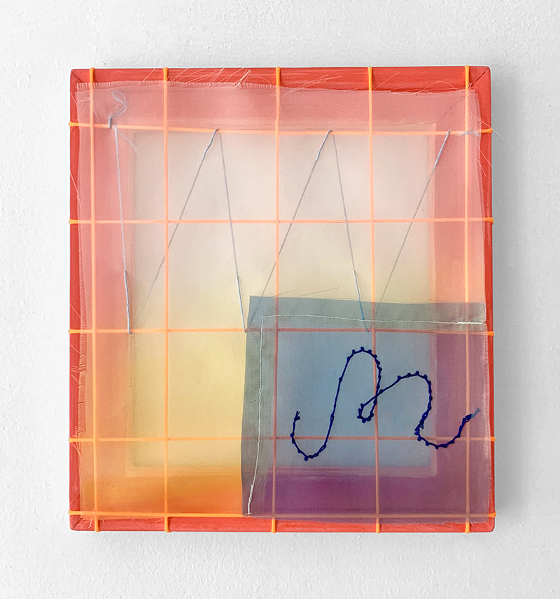 Red-orange painted frame with orange cording grid background and soft transluscent gradient overlay with embroidered m in lower quadrant