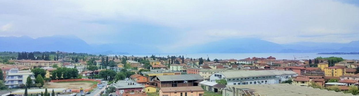 The view over Lake Garda on a grey day. In good weather you can see the mountains around the lake.