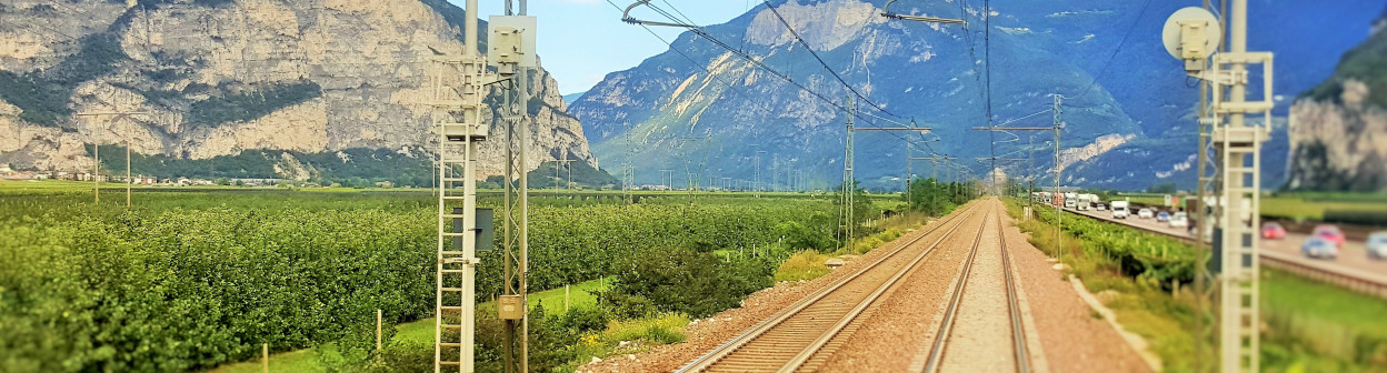 Heading north from Trento taken through the rear window of the last coach on the train