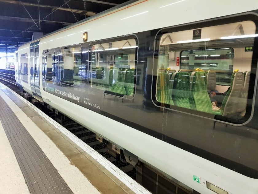 A Desiro awaits departure, note that some of the Standard class seats are arranged  3 +2