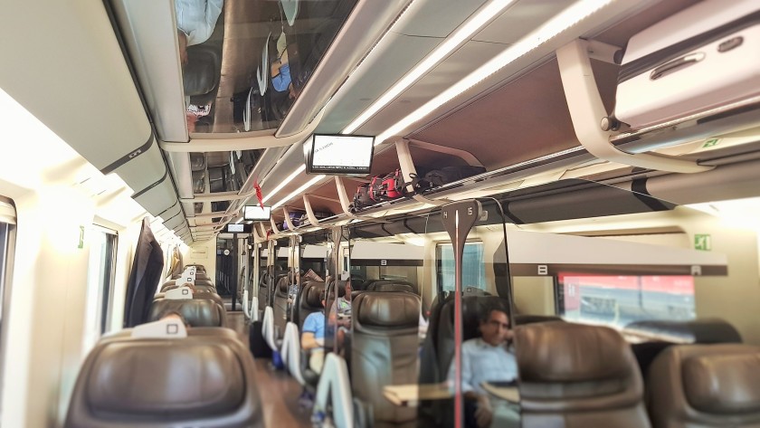 Info screens are suspend from the ceilings in all coaches