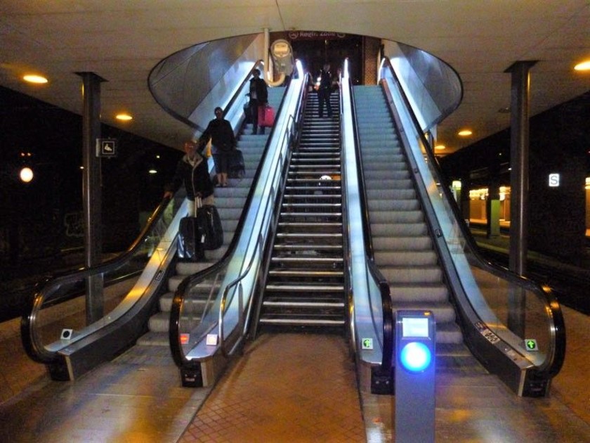 These escalators on the spor lead down from the concourse, those which lead up are behind them