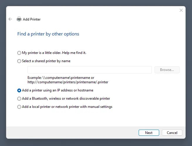 Windows Add Printer wizard selecting IP address option