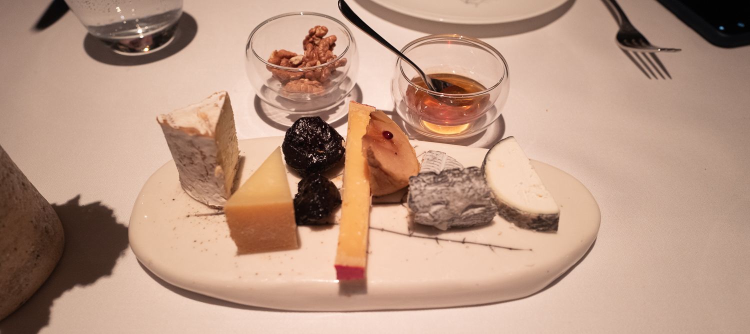 A mix of hard and soft cheeses paired with prunes, walnuts, and honey