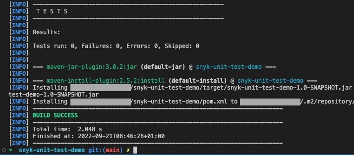 Terminal output showing Java unit tests with zero failures and a green “BUILD SUCCESS” Maven result.