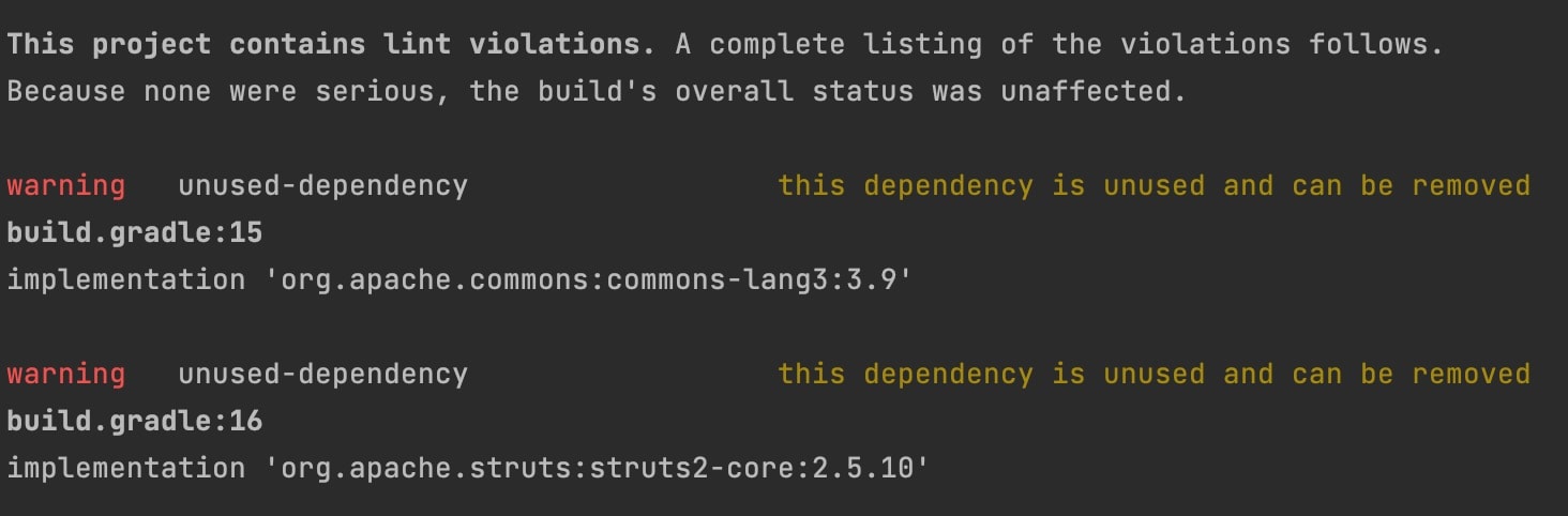 build.gradle内のApache Commons LangとStrutsの依存関係について、未使用の依存関係を示すlint警告が表示されたターミナル出力。