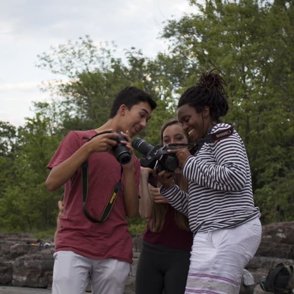 Youth photographers collaborating in Vermont