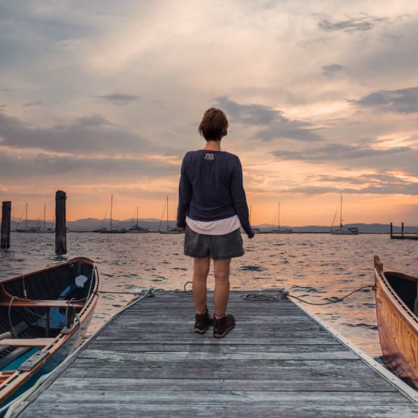 Photo student looking over a Vermont lake