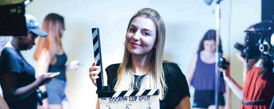 Student filmmakers creating a lip dub video