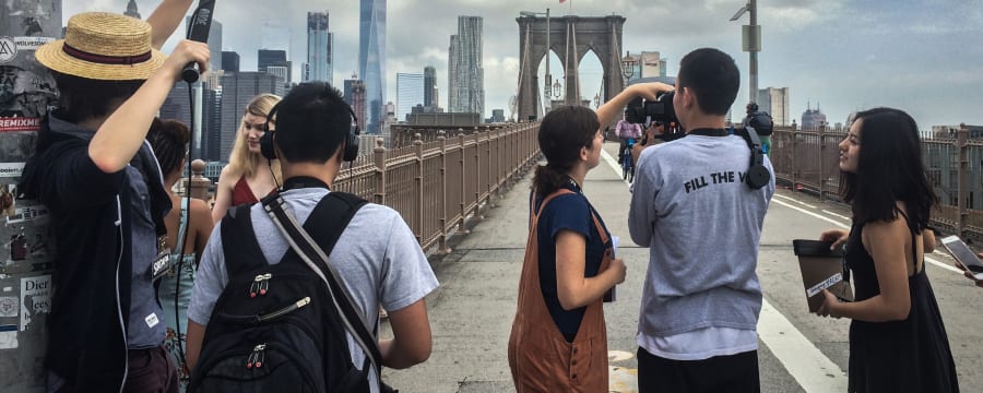 Teens on film shoot at Brooklyn Bridge