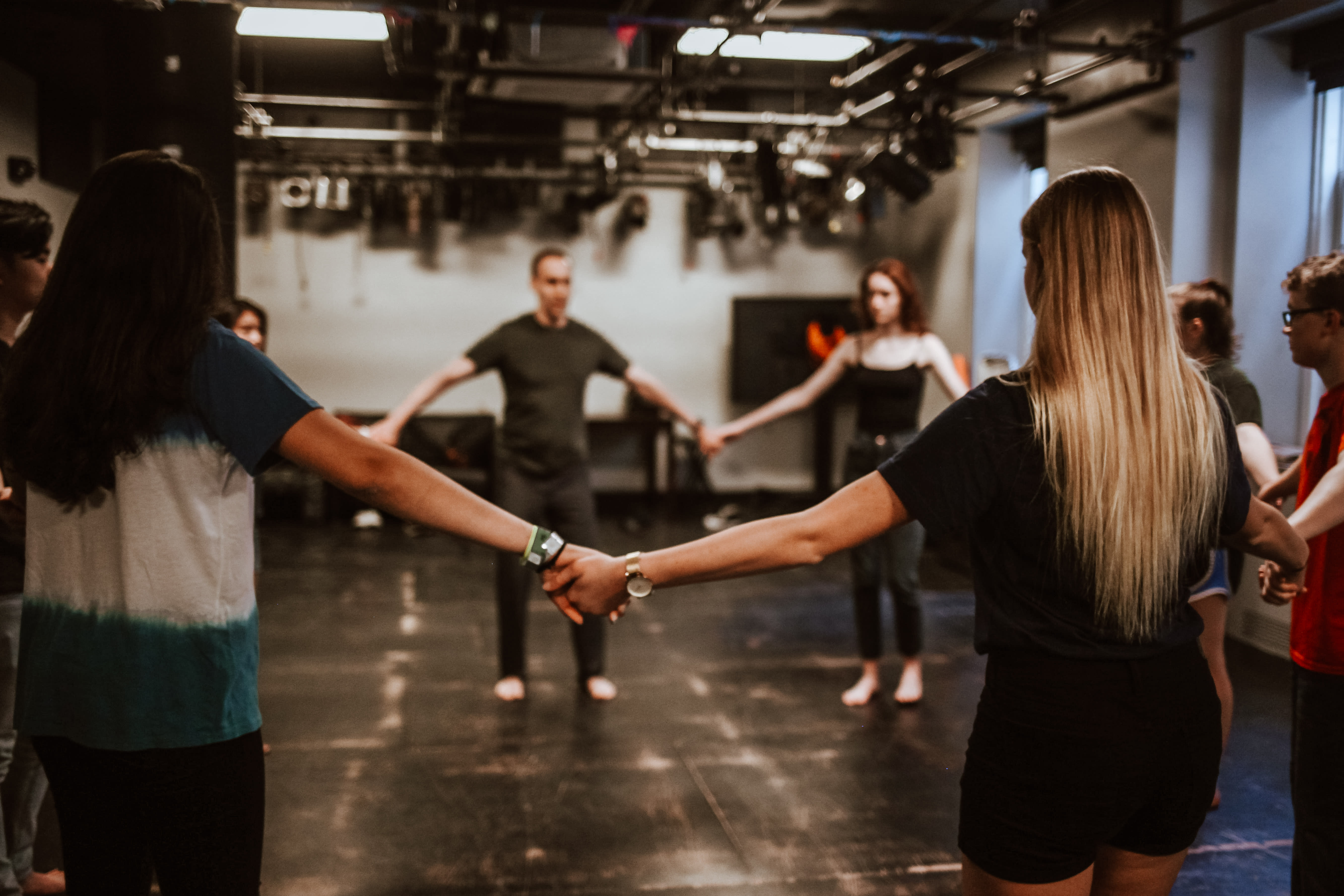 SOCAPA acting students in a circle exercise