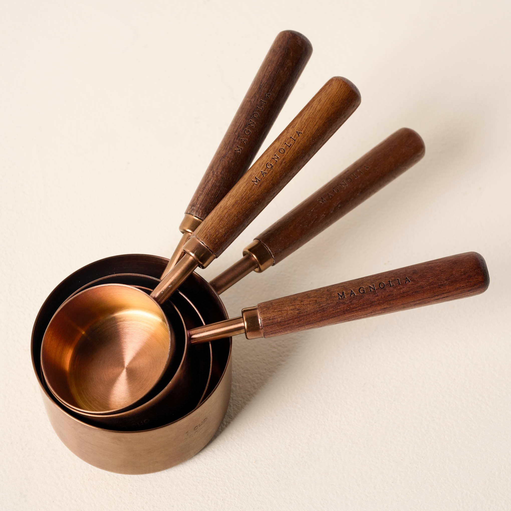 Walnut and Copper Measuring Cups On sale for $38.40, discounted from $48.00