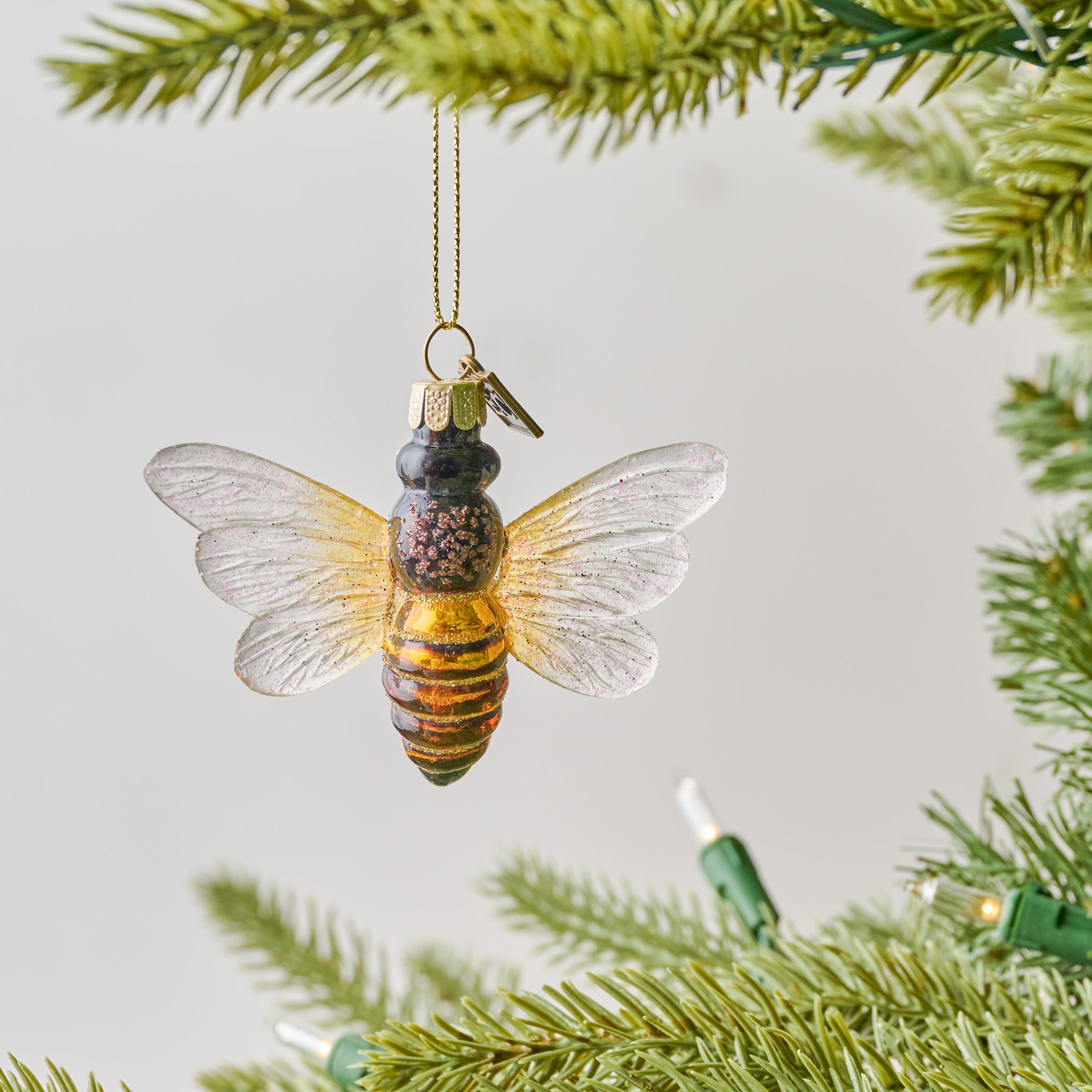 Bumblebee Ornament shown on tree