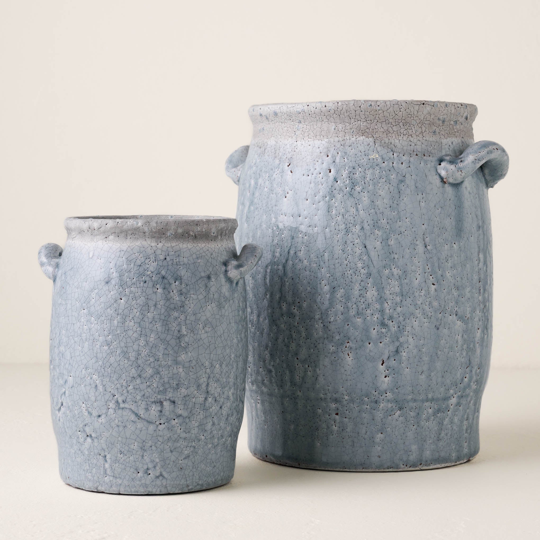 large and small sized light blue crackle vases with handles On sale for $43.20, discounted from $54.00