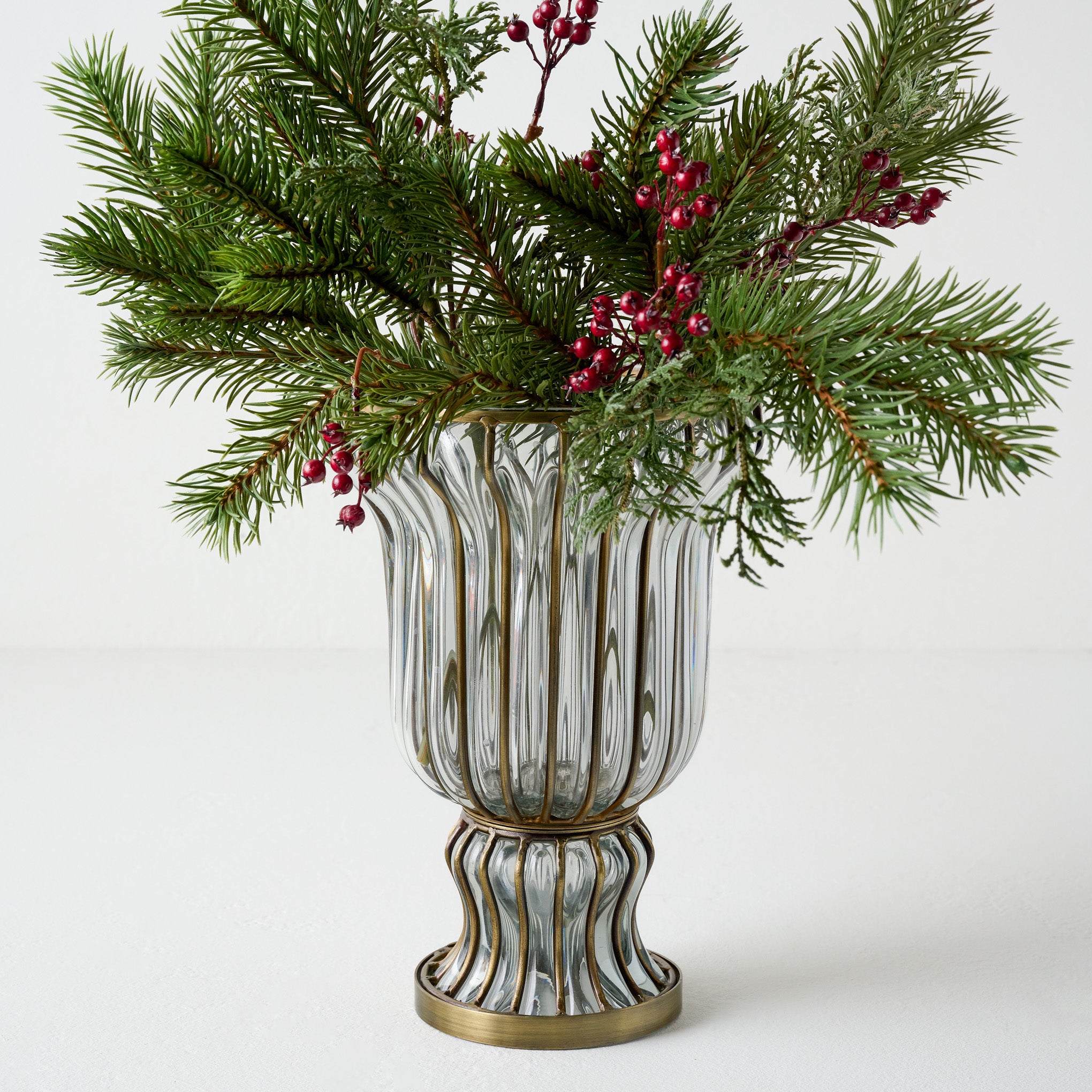 Diana Glass and Metal Vase shown with greenery