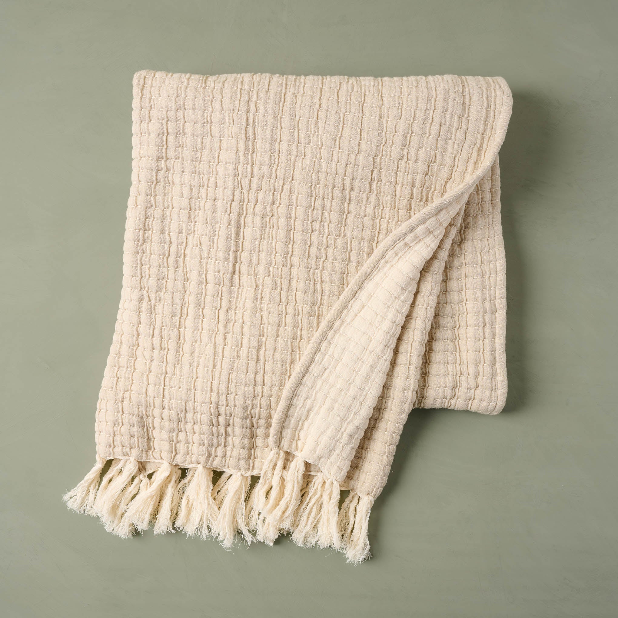 Oatmeal Kantha-Stitch Tassel Throw On sale for $60.00, discounted from $98.00