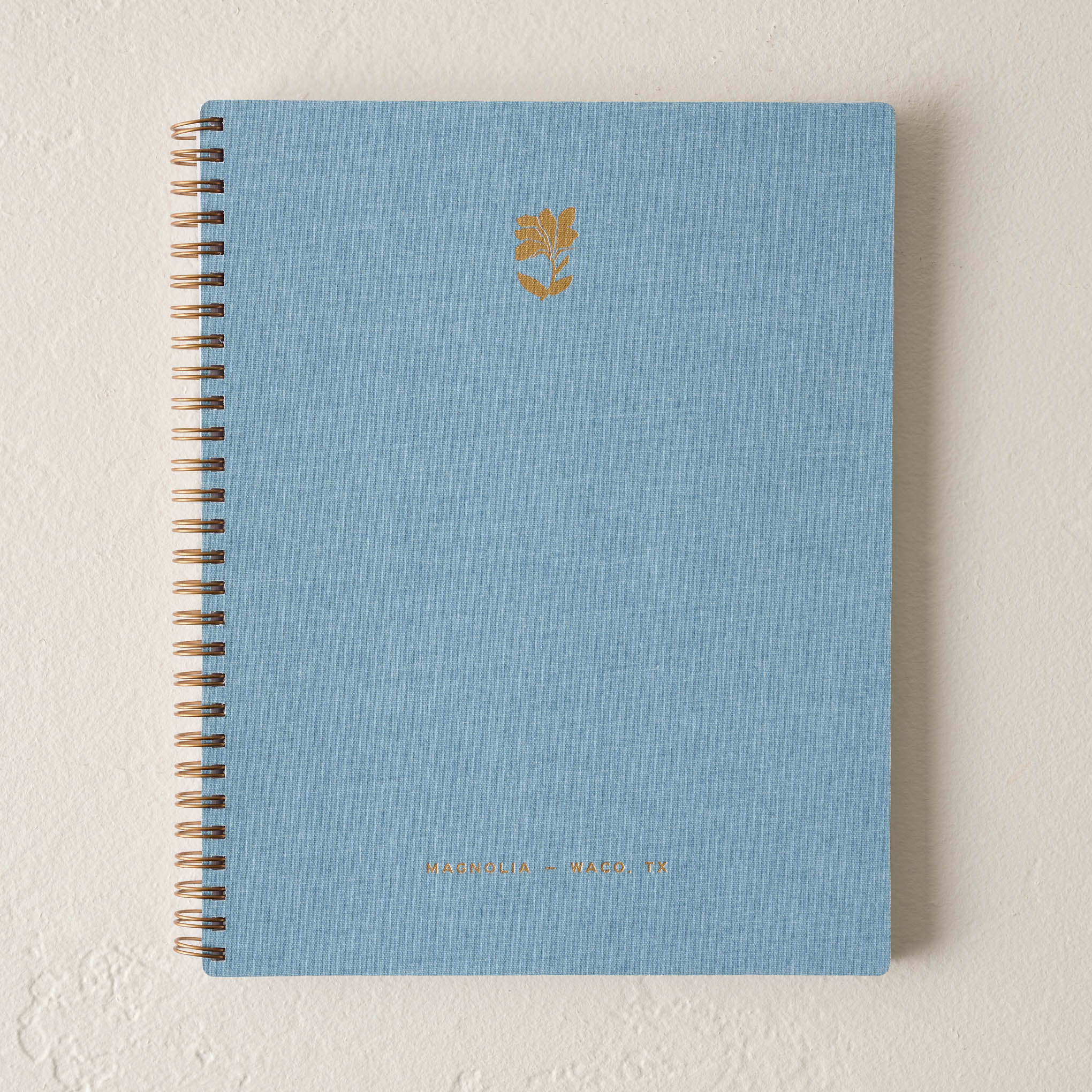 Chambray Blue Magnolia Flower Linen Notebook On sale for $22.40, discounted from $28.00