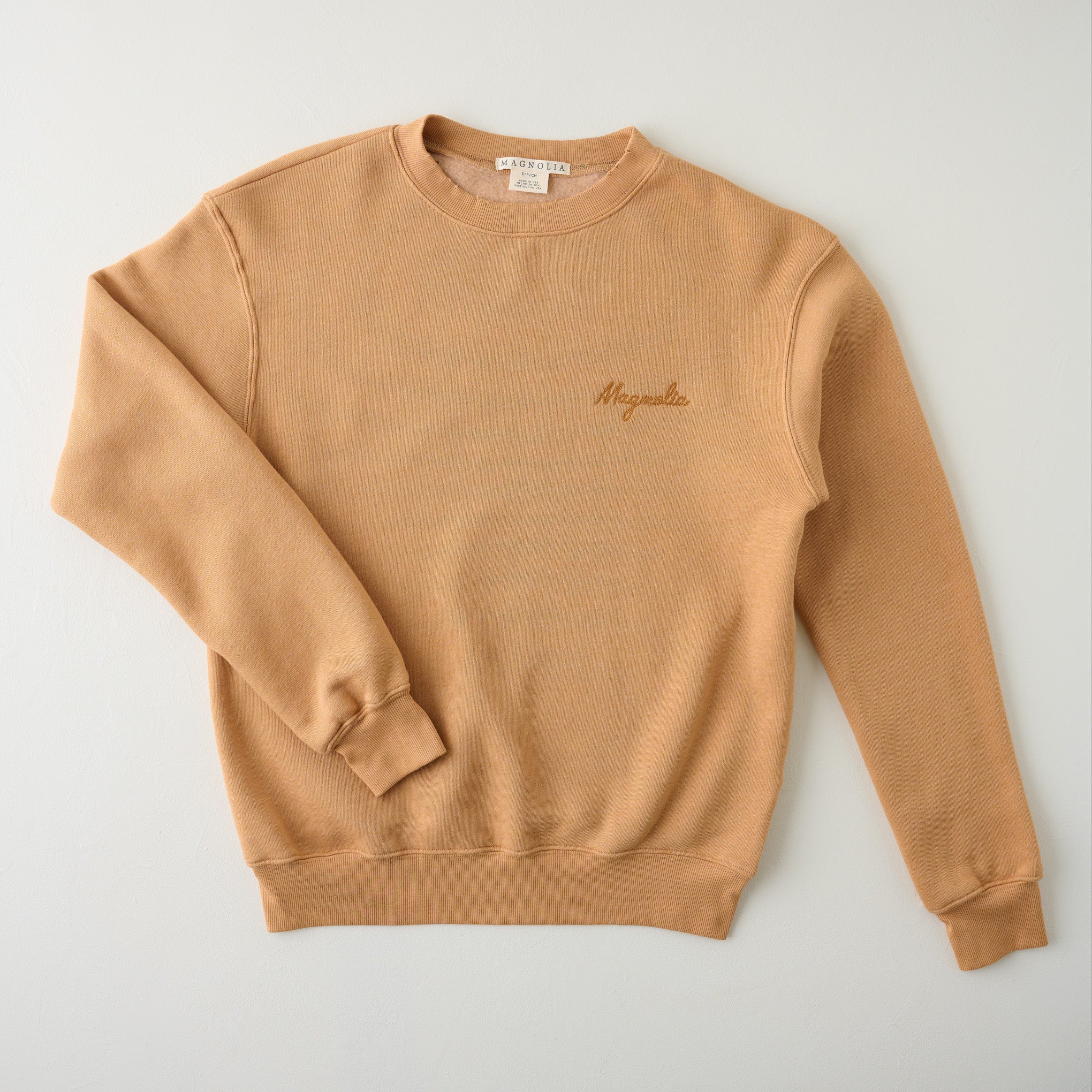 Magnolia Embroidered Camel Crewneck $64.00