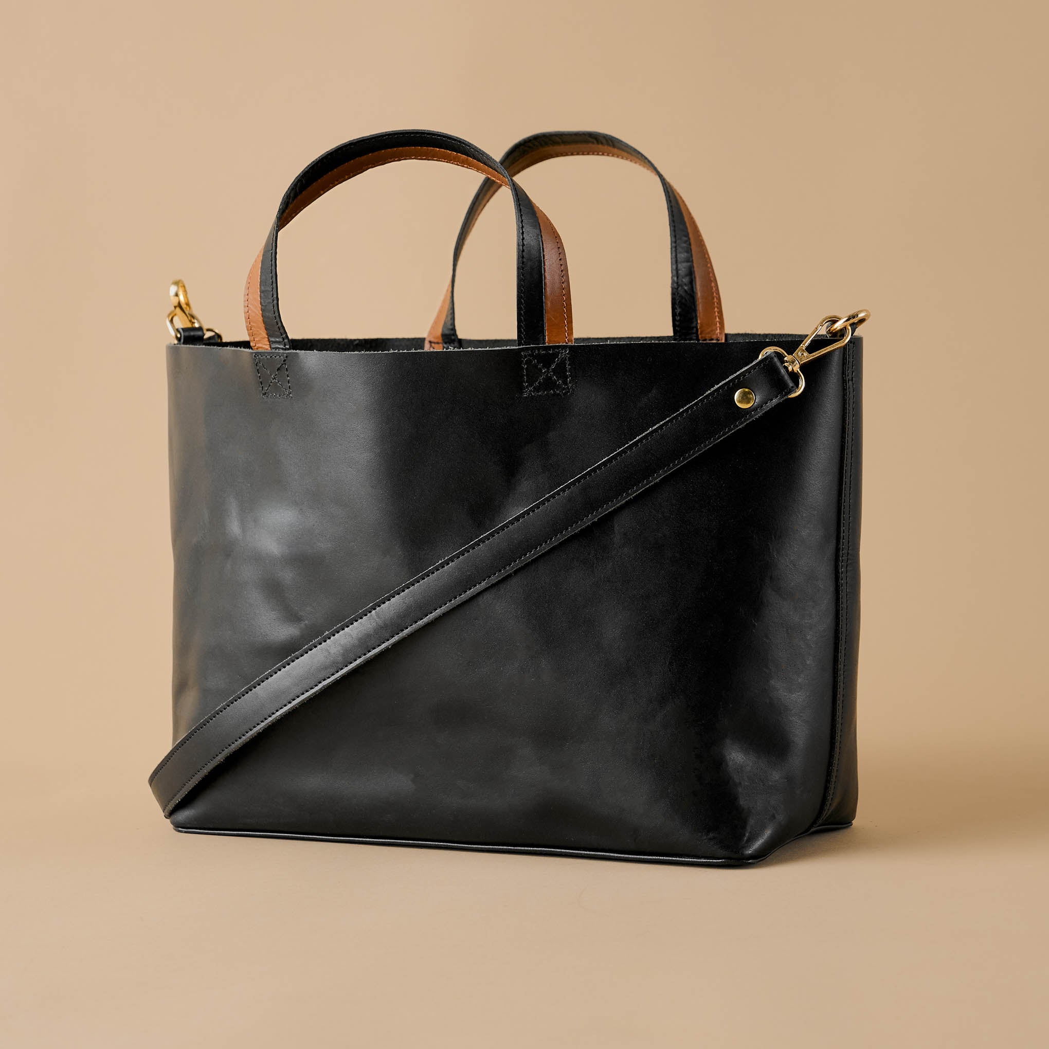 Magnolia Essential Black Crossbody Tote On sale for $166.60, discounted from $238.00