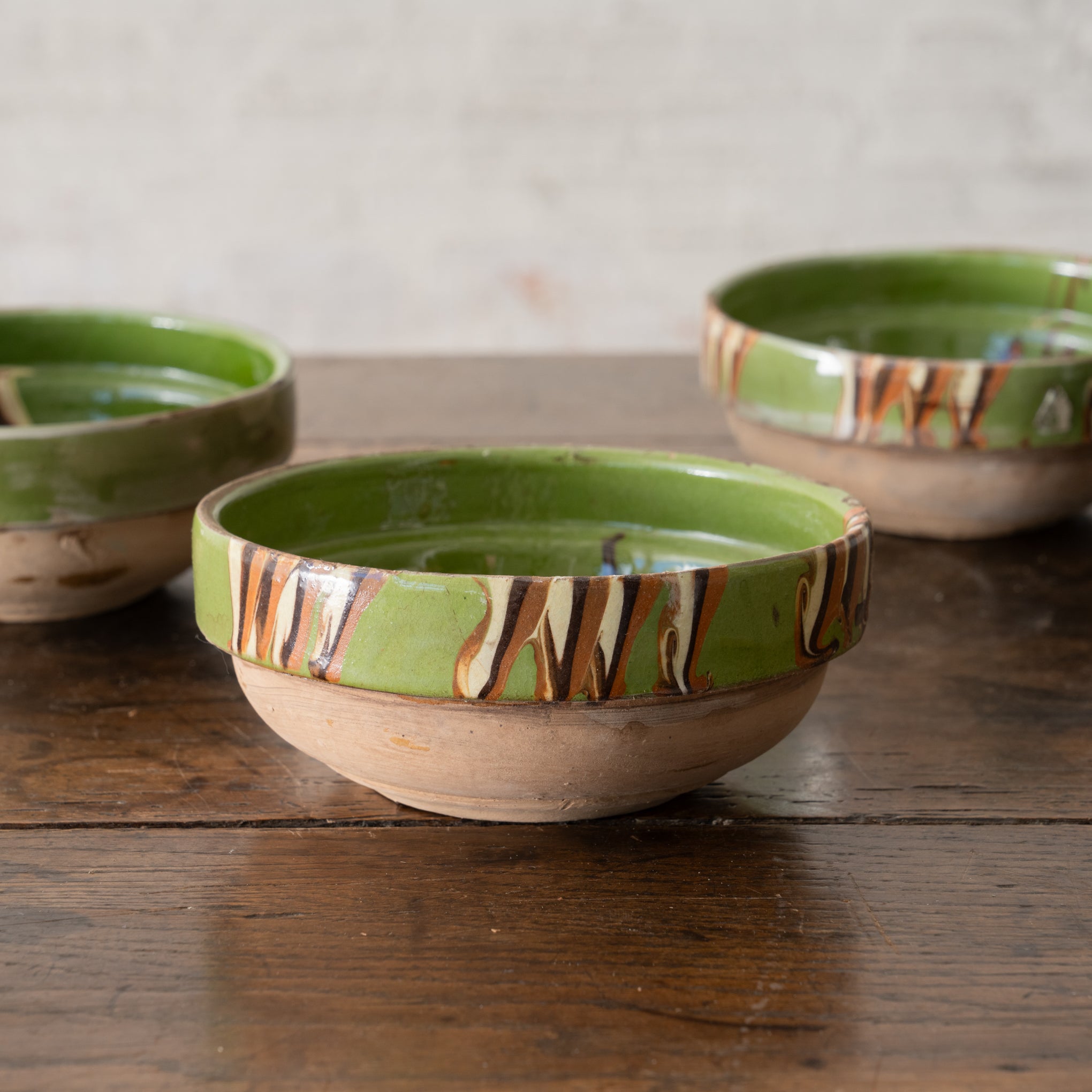 group of Vintage Green Rim Painted Terracotta Bowls