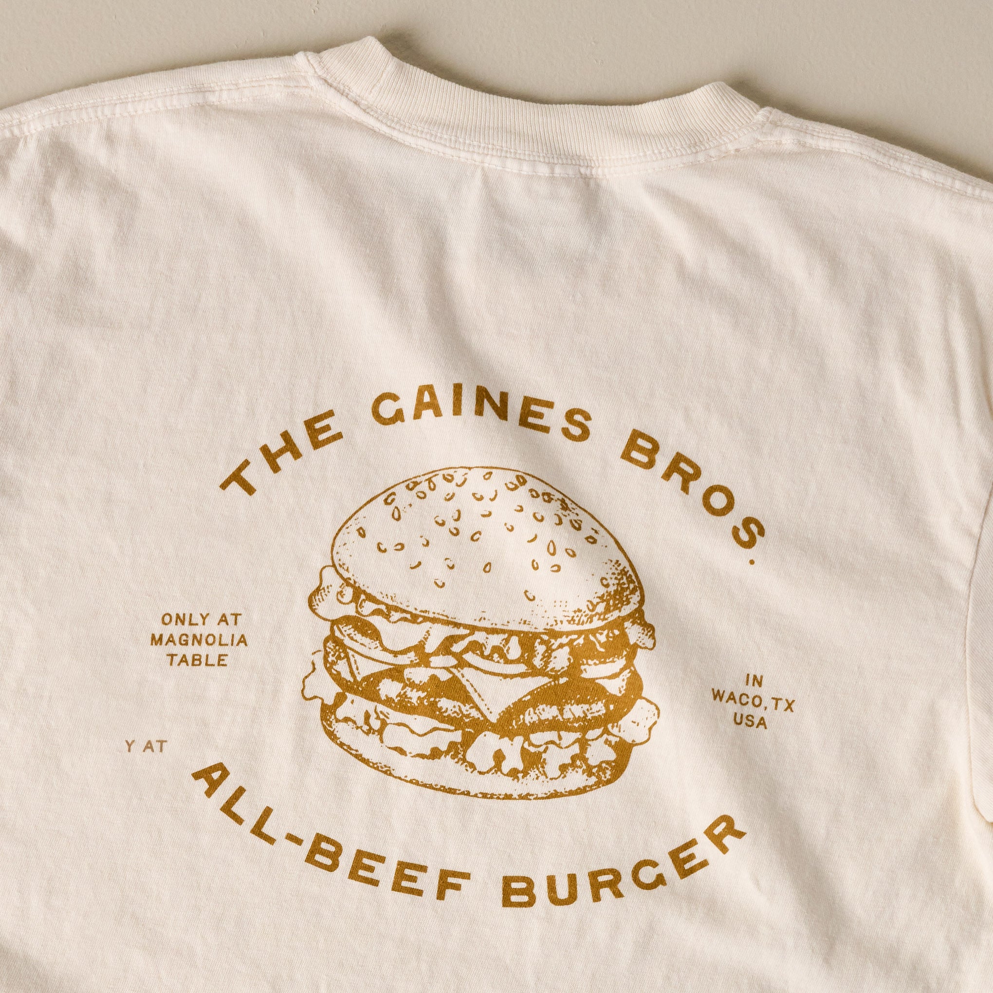 Back of Gaines Bros Burger Ivory Tee close up