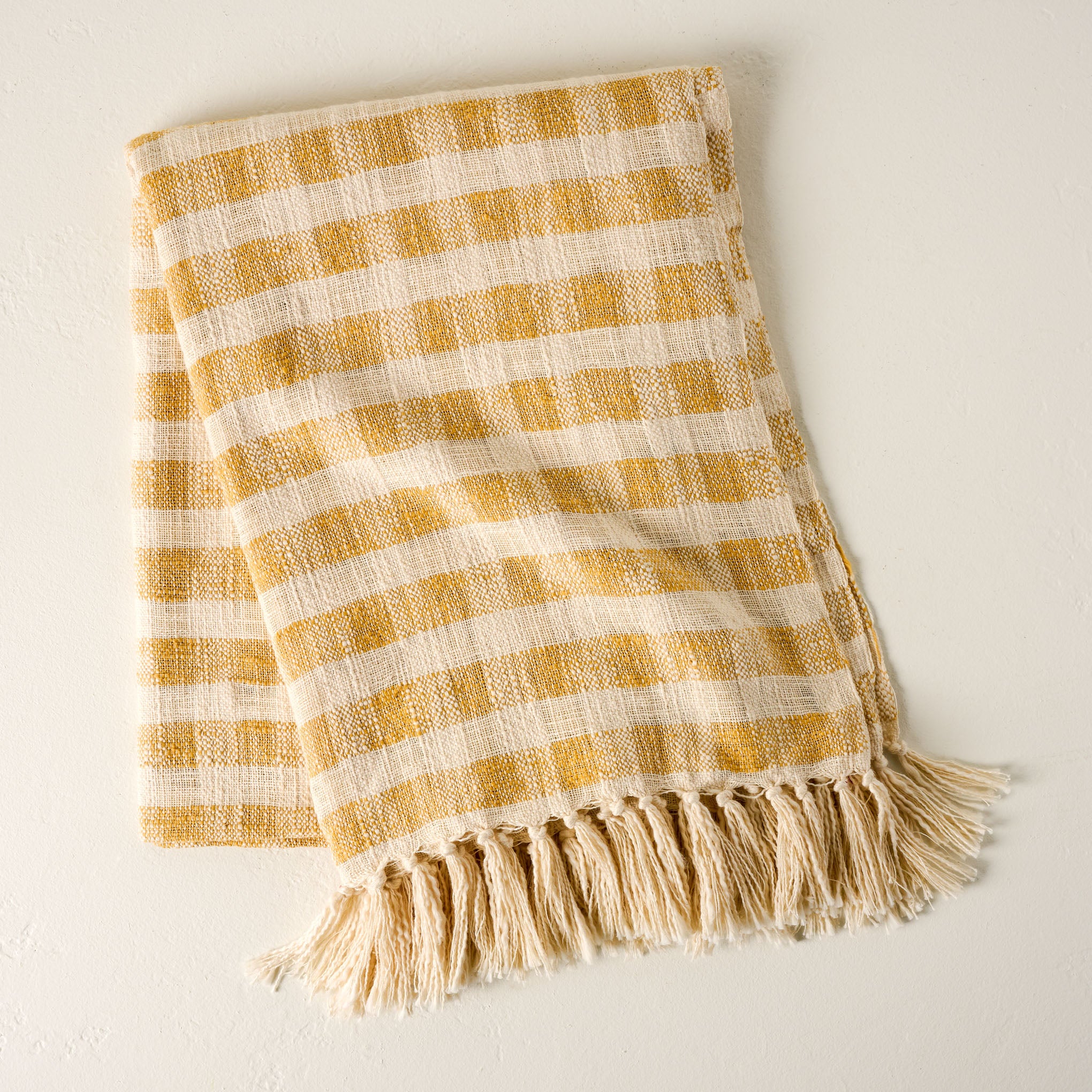 Yellow Gingham Tassel Blanket $58.00