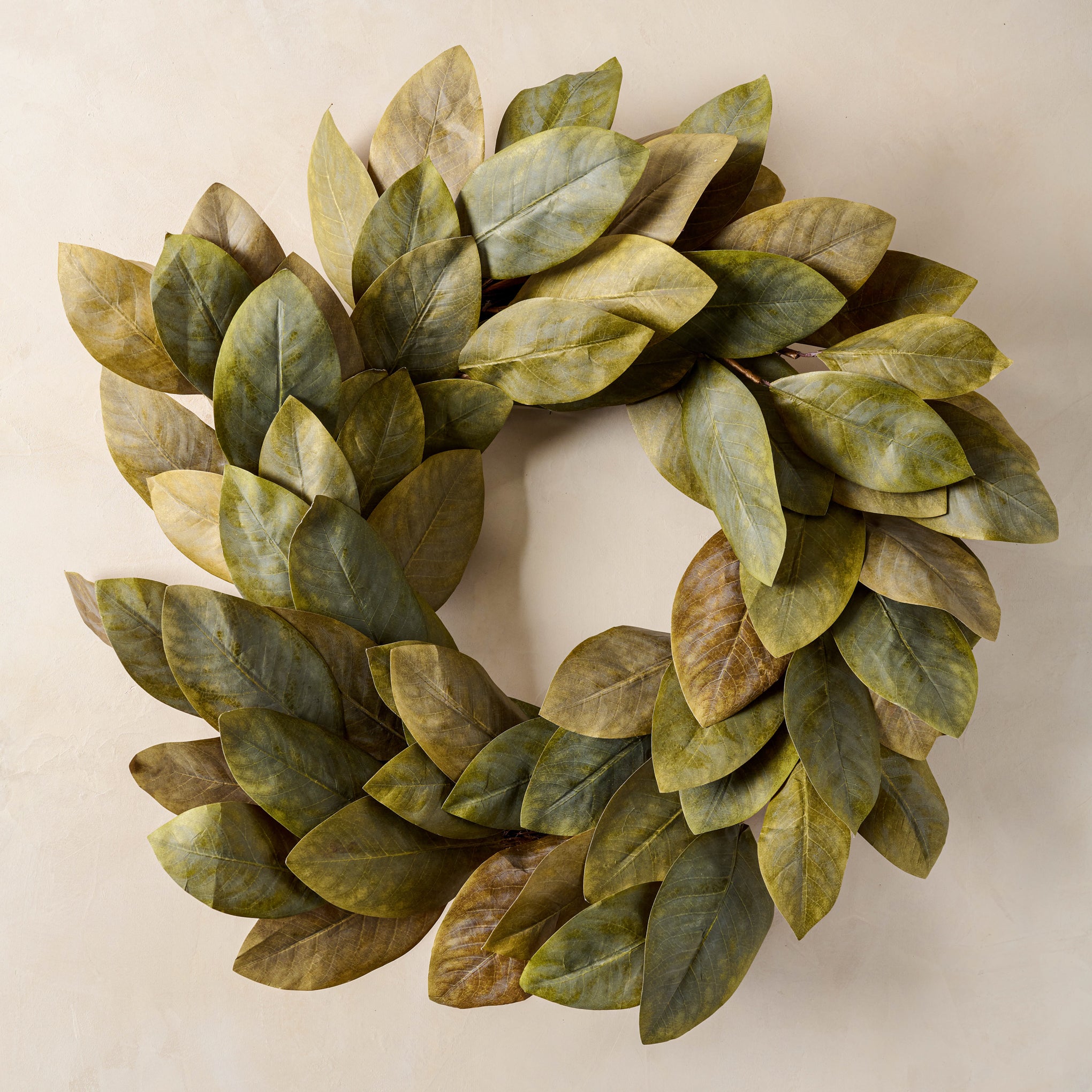 Signature Magnolia Wreath with beige background