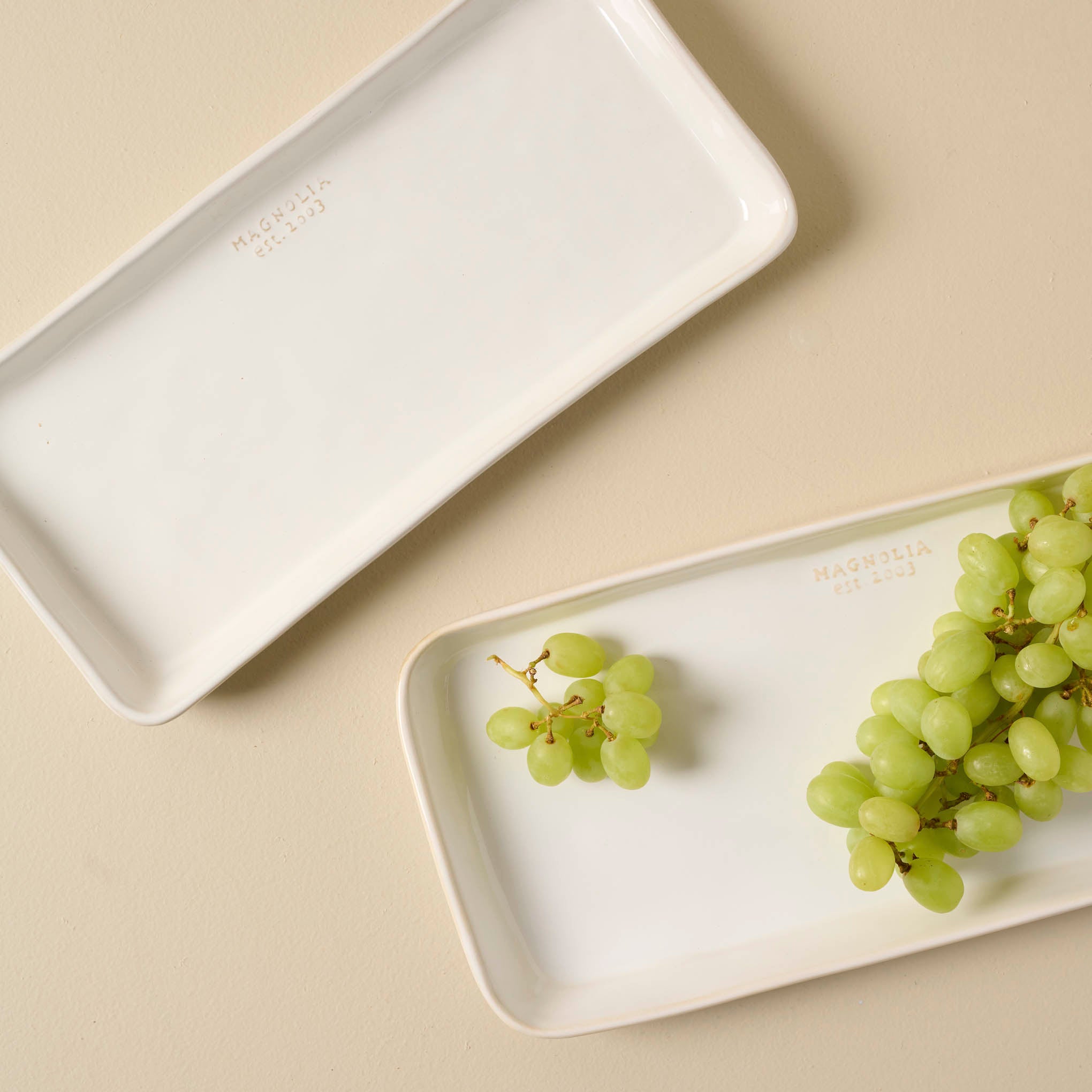 Magnolia Est. Ceramic Rectangular Platter with green grapes Items range from $26.00 to $34.00