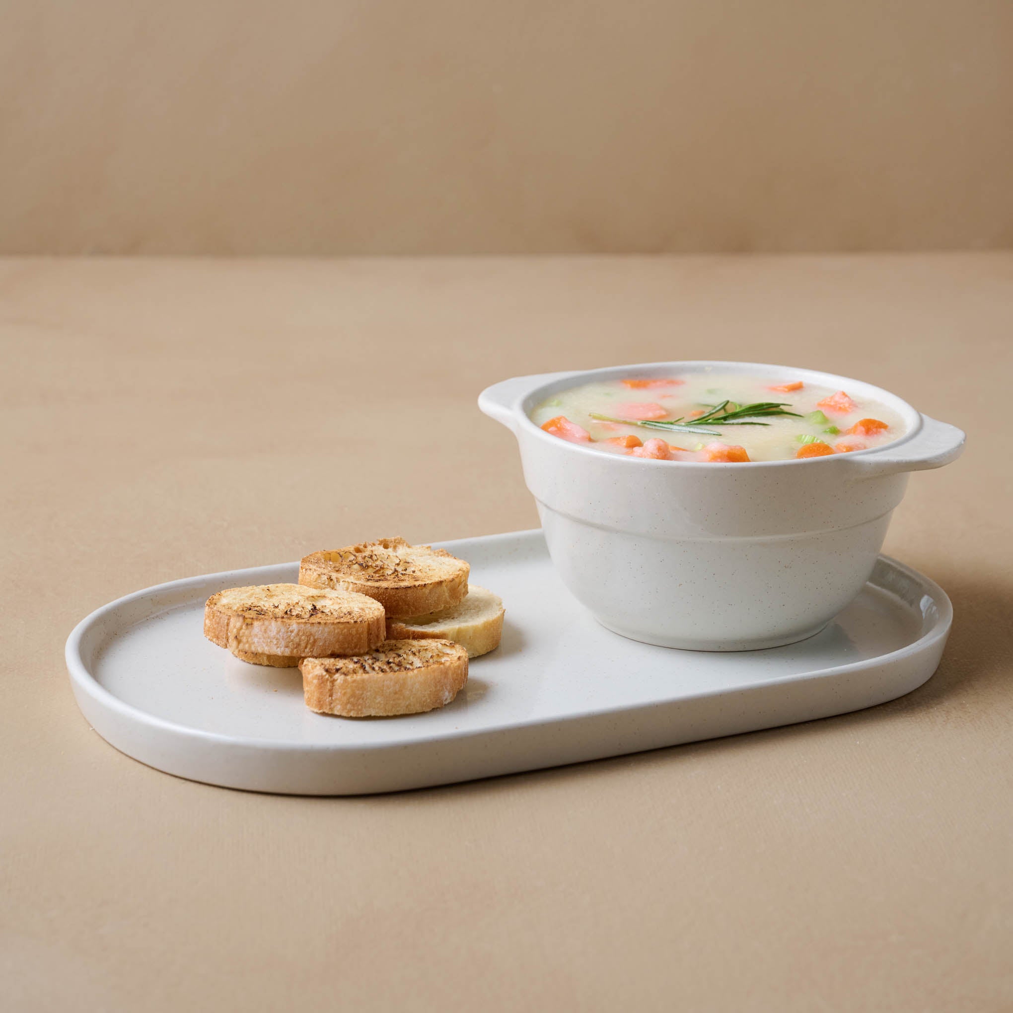 Cream Speckled Soup Bowl and Tray with soup and bread On sale for $32.20, discounted from $46.00