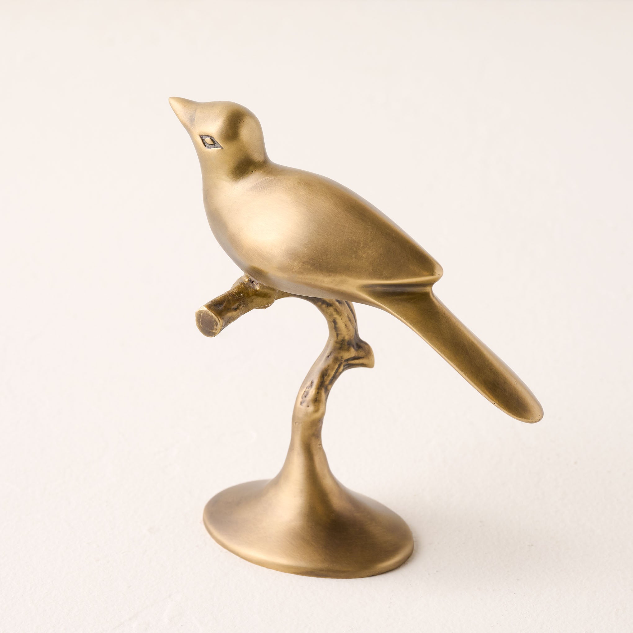 Brass Bird Sit About