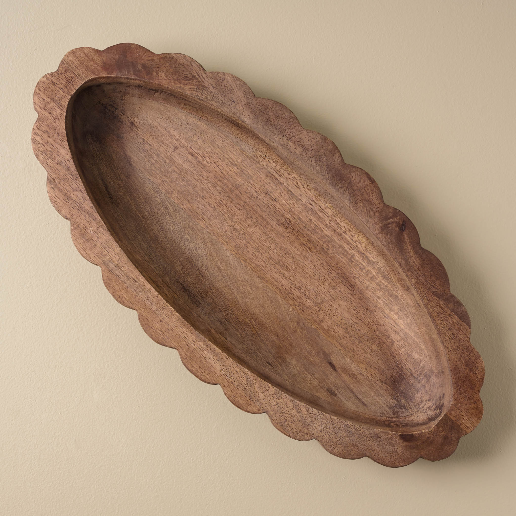 top view of oval antiqued wood tray with scallop edge $40.00