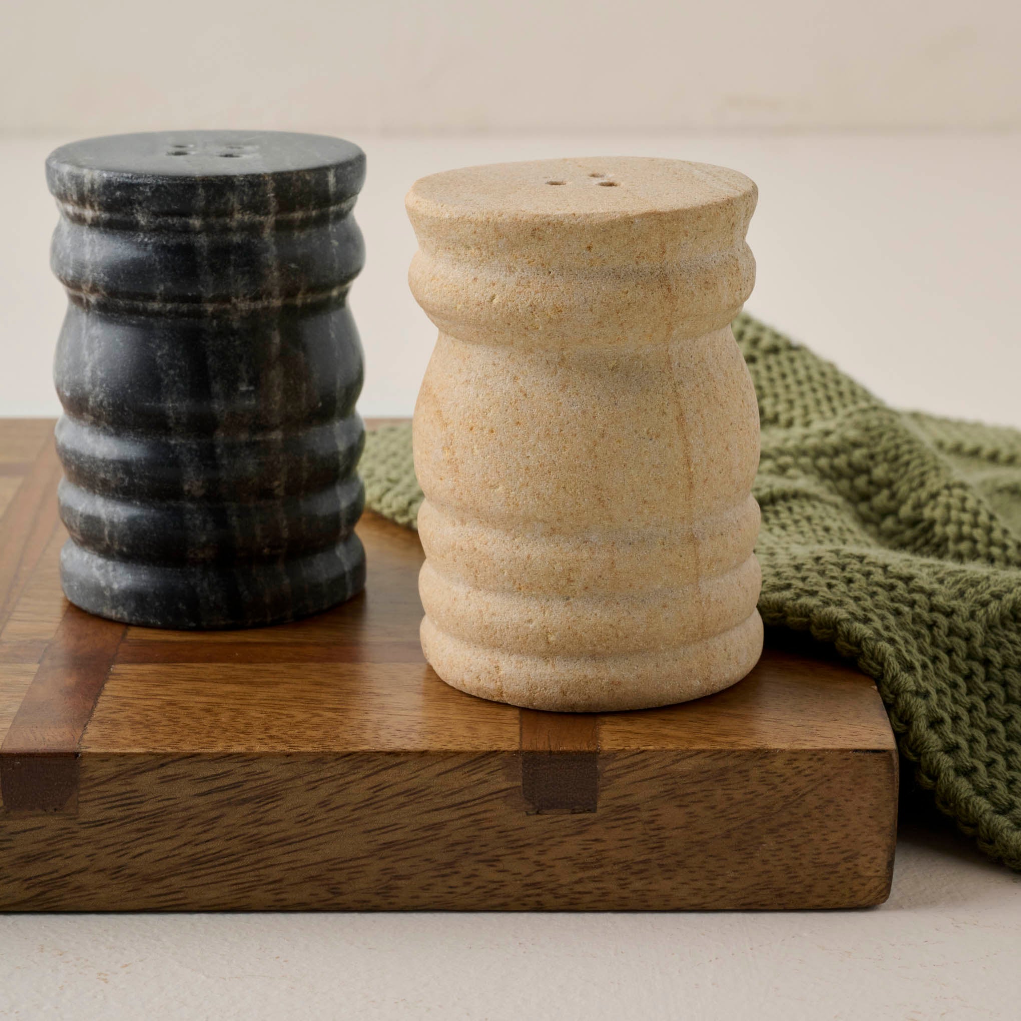 Turned Marble Salt & Pepper Shaker Set shown on serving board