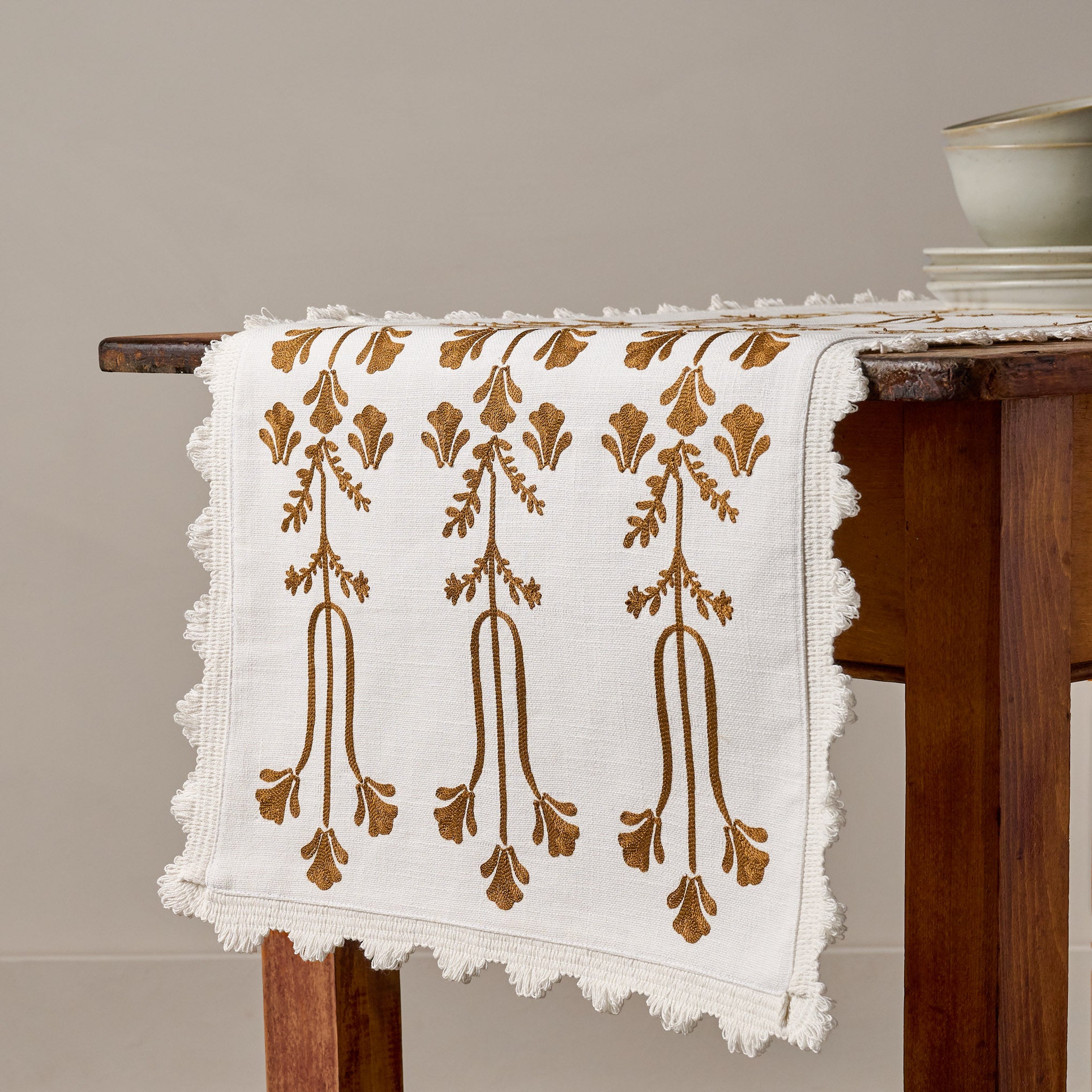 Tulip Embroidered Table Runner on a table